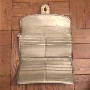 Coach Bags - Coach large bifold wallet brown and gold Coach Bags - Coach large bifold wallet brown and gold